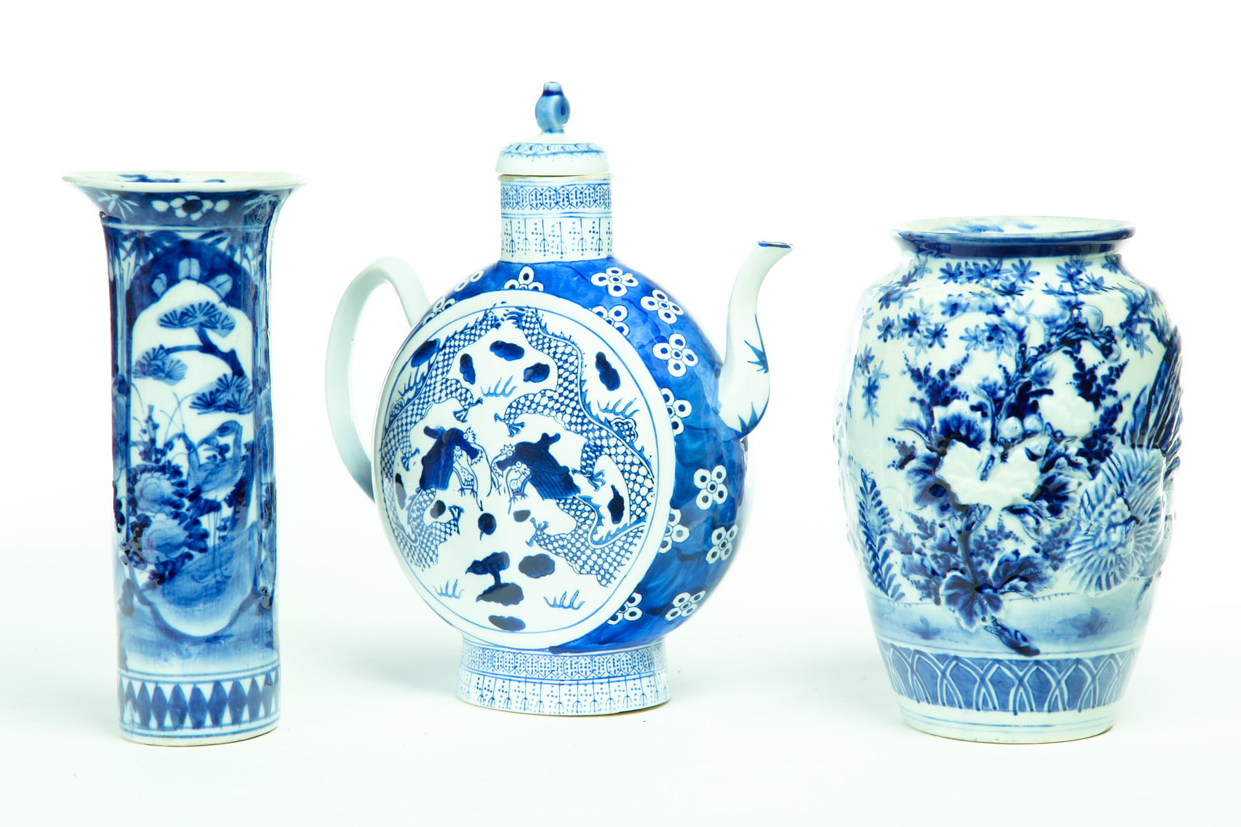 Appraisal: TWO VASES AND A TEAPOT China th century Blue and