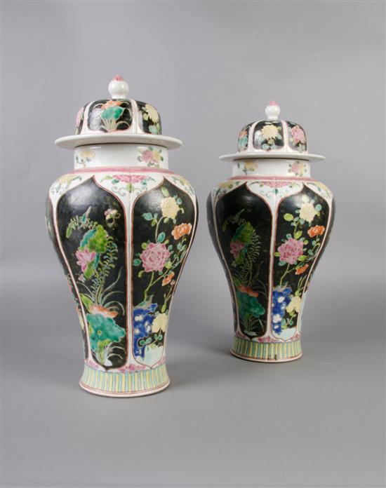 Appraisal: A Pair of Famille Noir Lidded Vases Height inches