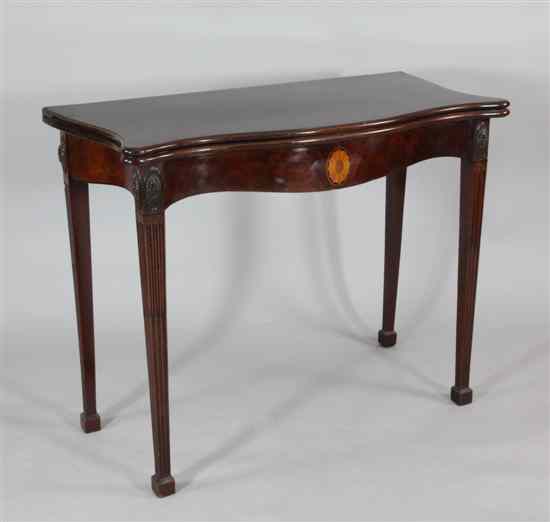 Appraisal: A George III mahogany serpentine card table c on part