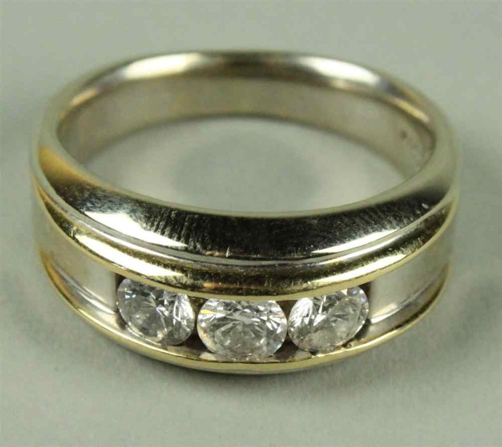 Appraisal: WHITE AND YELLOW GOLD DIAMOND THREE STONE RING marked cast