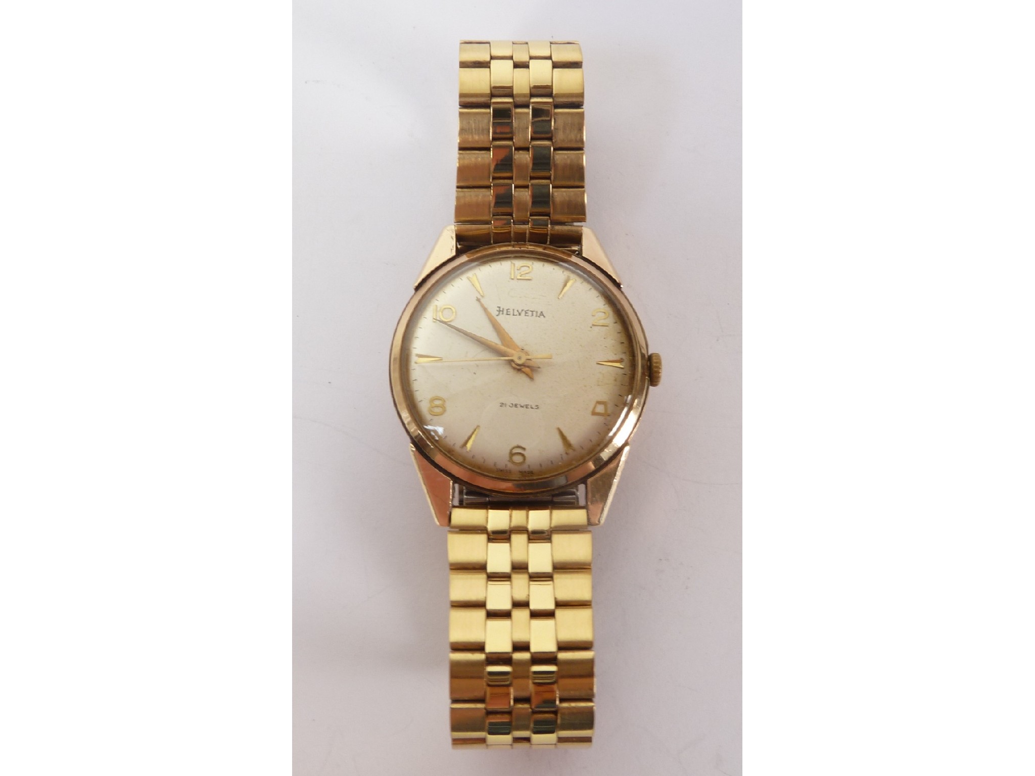 Appraisal: A CT GOLD CASED HELVITICA GENTLEMAN'S WRIST WATCH ON REPLACED