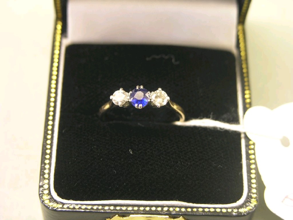 Appraisal: An ct gold sapphire and diamond half-hoop ring central sapphire