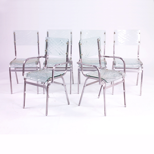 Appraisal: Set of glass and metal chairs with two arm chairs