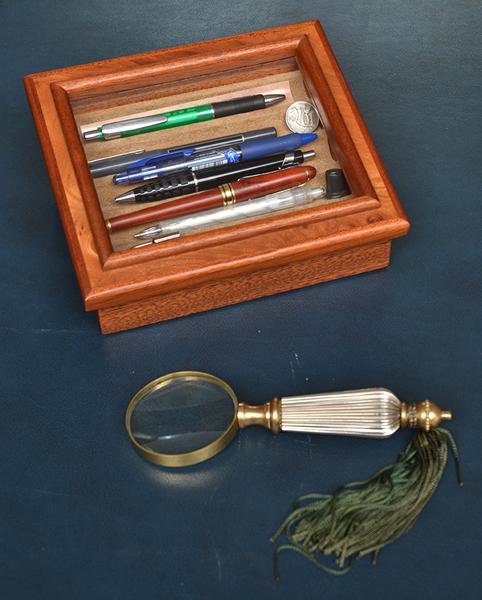 Appraisal: PEN HOLDALL TOGETHER WITH A BRASS HANDLED MAGNIFYING GLASS