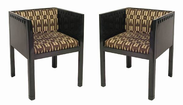 Appraisal: A pair of Secessionist style black lacquered armchairs height in