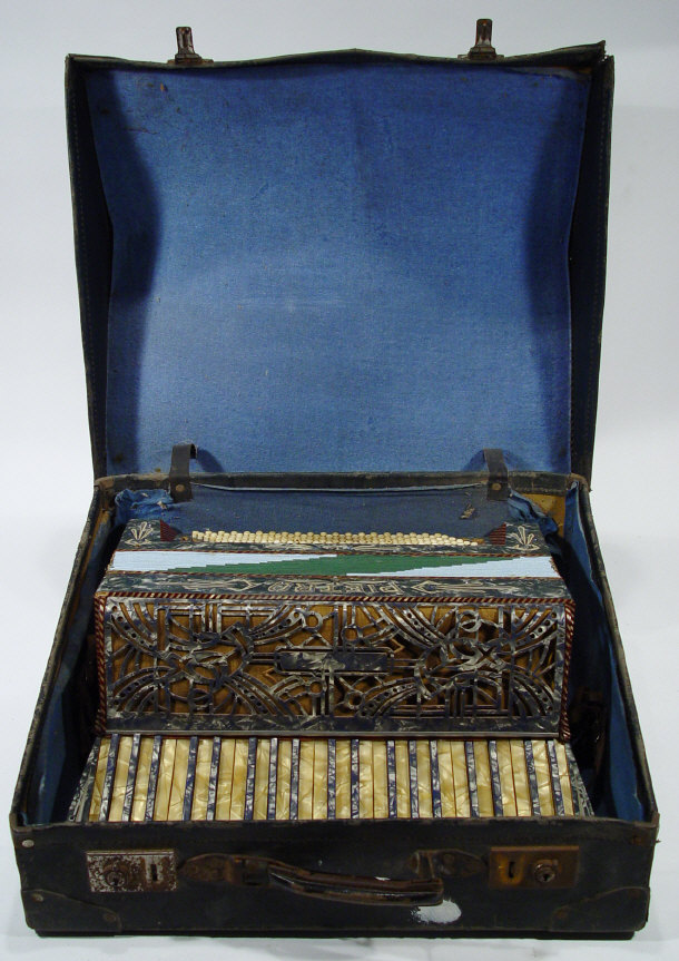 Appraisal: German Pietro accordion with ornate pierced marbleised casing and keys