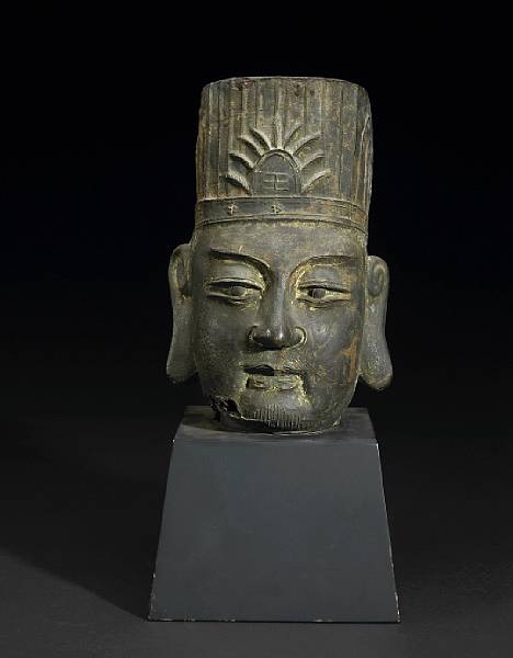 Appraisal: A cast iron head of a Daoist deity or deified