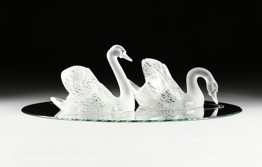 Appraisal: A PAIR OF LARGE LALIQUE CRYSTAL SWANS AND MIRROR PANEL