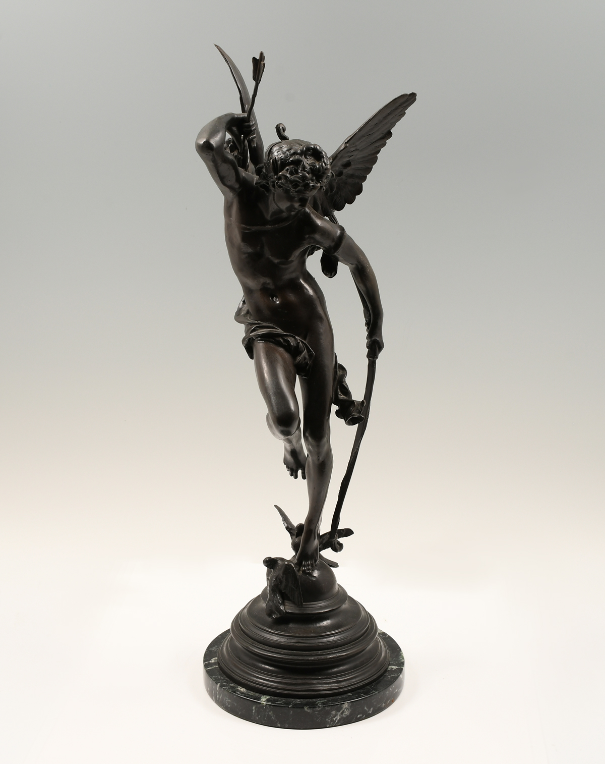 Appraisal: CUPID BRONZE AFTER THE ANTIQUE Cupid Reaching into his Quiver