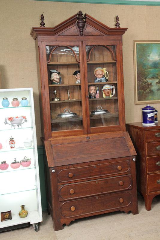 Appraisal: TWO PIECE SECRETARY BOOKCASE Walnut with a steepled and molded