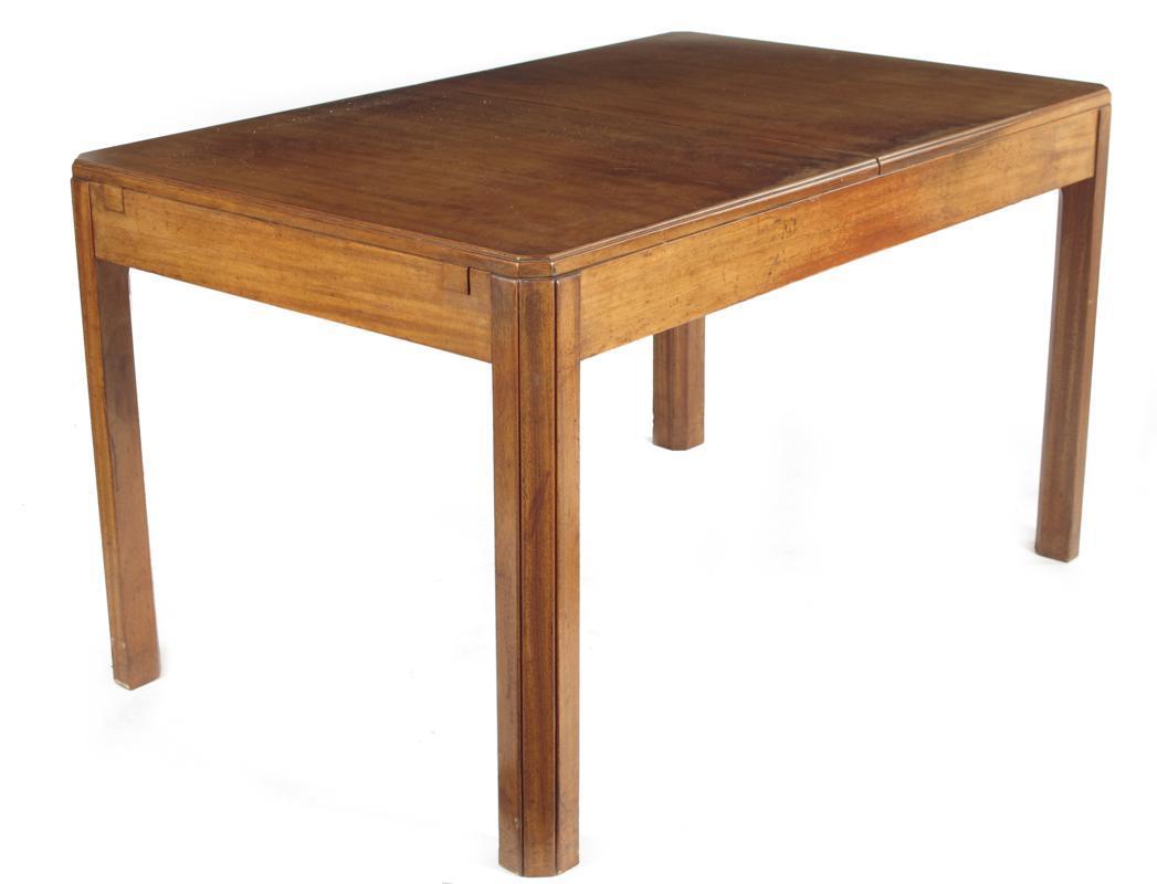 Appraisal: A Heals mahogany extending dining table