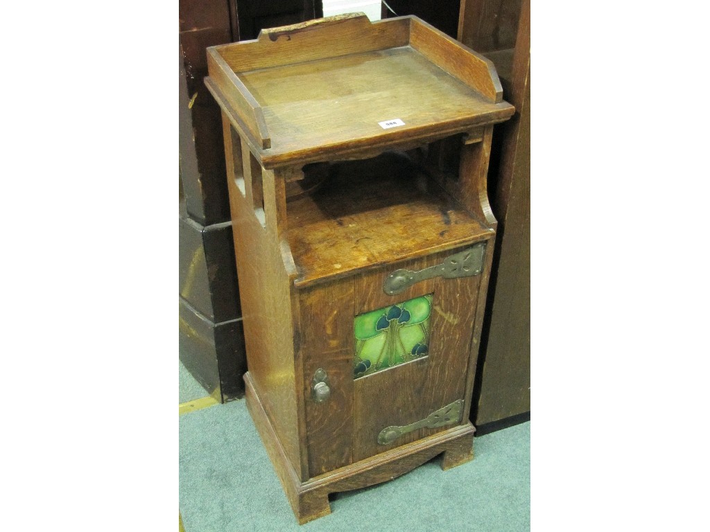 Appraisal: Art Nouveau oak pot cupboard with tile insert