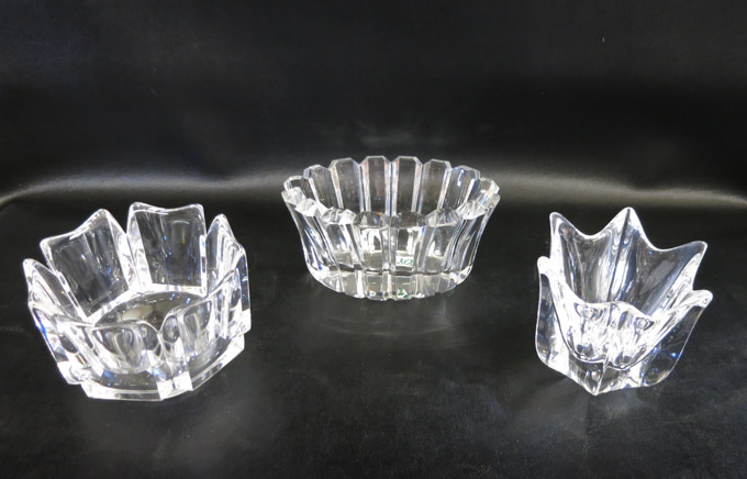 Appraisal: THREE ORREFORS CLEAR CRYSTAL BOWLS various shapes each engraved Orrefors