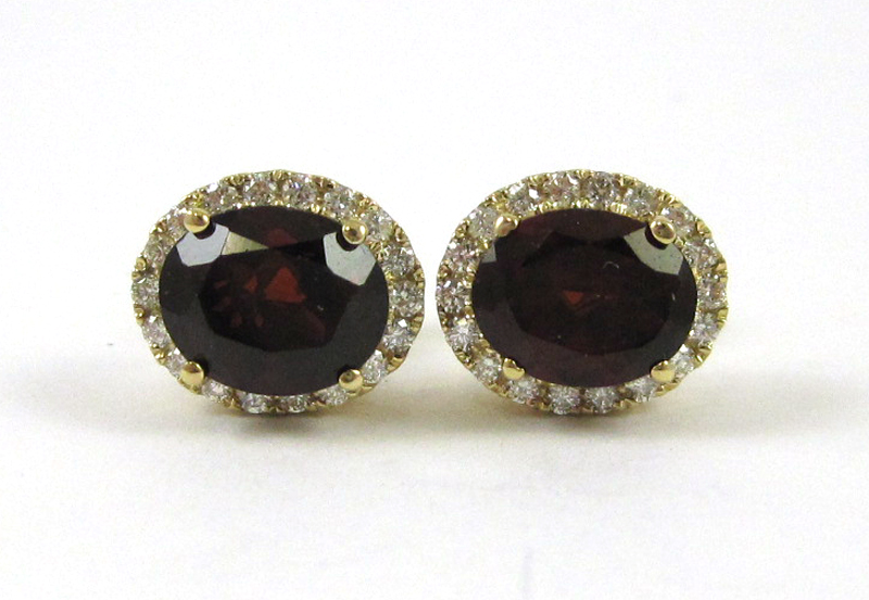 Appraisal: PAIR OF GARNET AND DIAMOND EARRINGS each k yellow gold