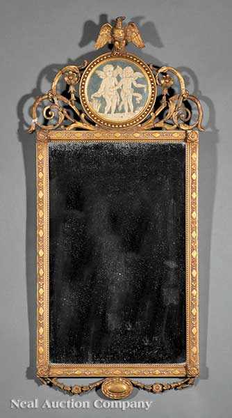 Appraisal: A George III-Style Giltwood Mirror in the Neoclassical taste the