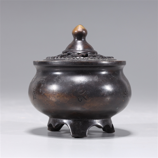 Appraisal: Chinese bronze covered tripod censer with calligraphy to body gilt