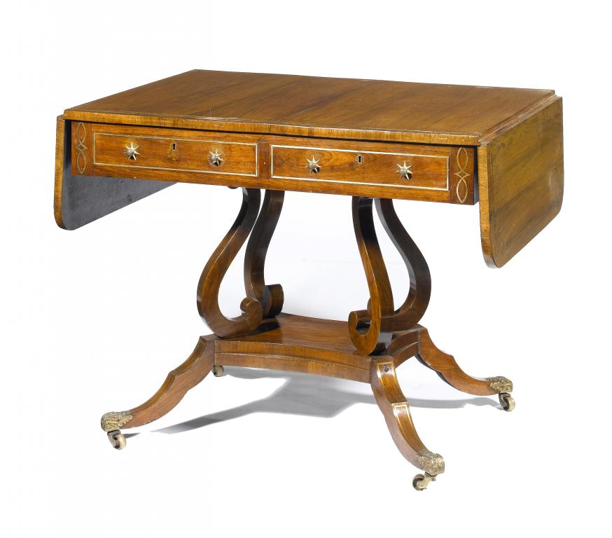 Appraisal: A GEORGE IV BRASS-INLAID ROSEWOOD SOFA TABLE fitted with a