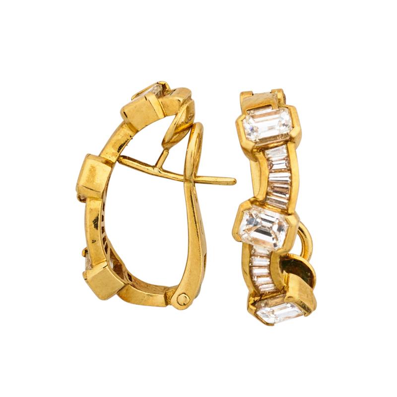 Appraisal: DIAMOND K YELLOW GOLD EARRINGS Sinuous channel of baguette cut