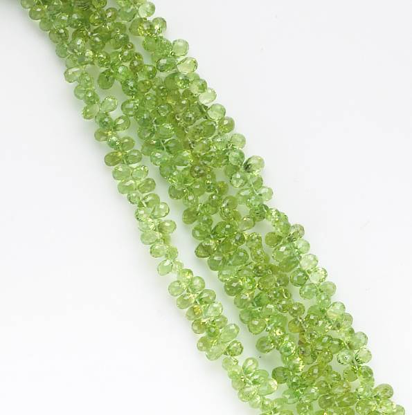 Appraisal: A peridot and k gold torsade necklace length in