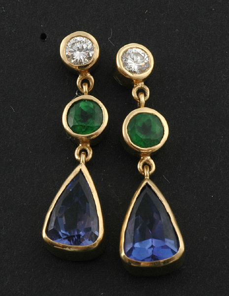 Appraisal: A pair of diamond spinel and tanzanite earrings Each pear