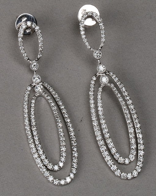 Appraisal: A PAIR OF DIAMOND SET DROP HOOP EARRINGS a diamond