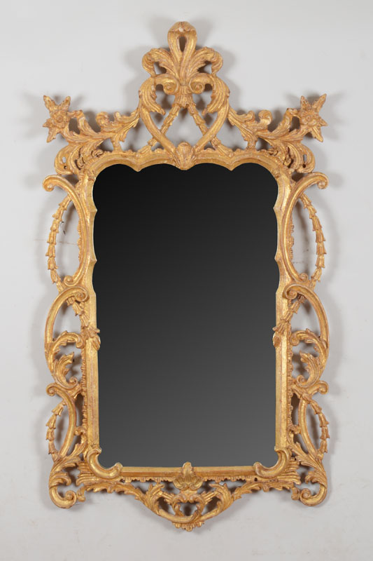 Appraisal: Chippendale Style Carved Giltwood Mirror With pierced foliate and flower