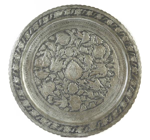 Appraisal: A Persian silvered metal and repousse circular plaque diameter in