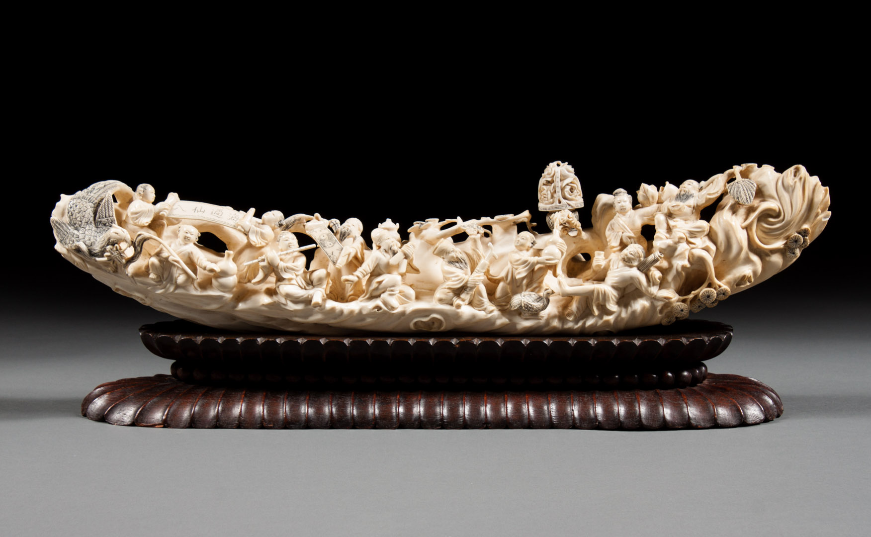 Appraisal: Chinese carved ivory figural group late th early th century