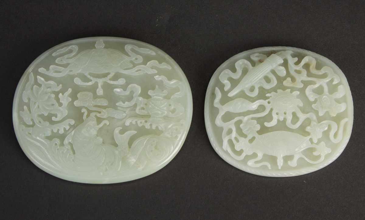 Appraisal: Chinese White Jade Plaques th cent Relief decoration Condition Small