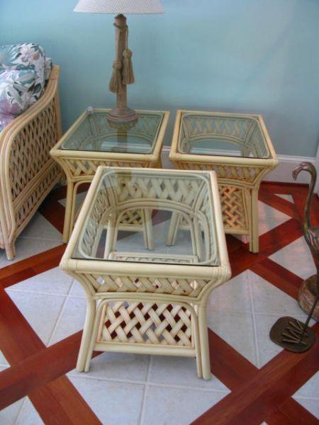 Appraisal: Three Rattan Side Tables with glass top and lower rattan