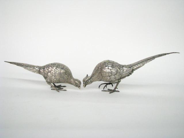 Appraisal: Pair of Silver Plate decorative Pheasants approximately length