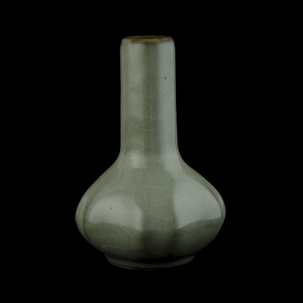 Appraisal: CHINESE CELADON GLAZE RIBBED BOTTLE VASE Antique Chinese celadon green