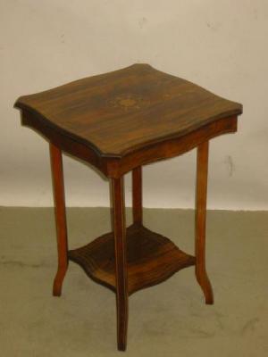 Appraisal: A VICTORIAN ROSEWOOD OCCASIONAL TABLE of serpentine square form with