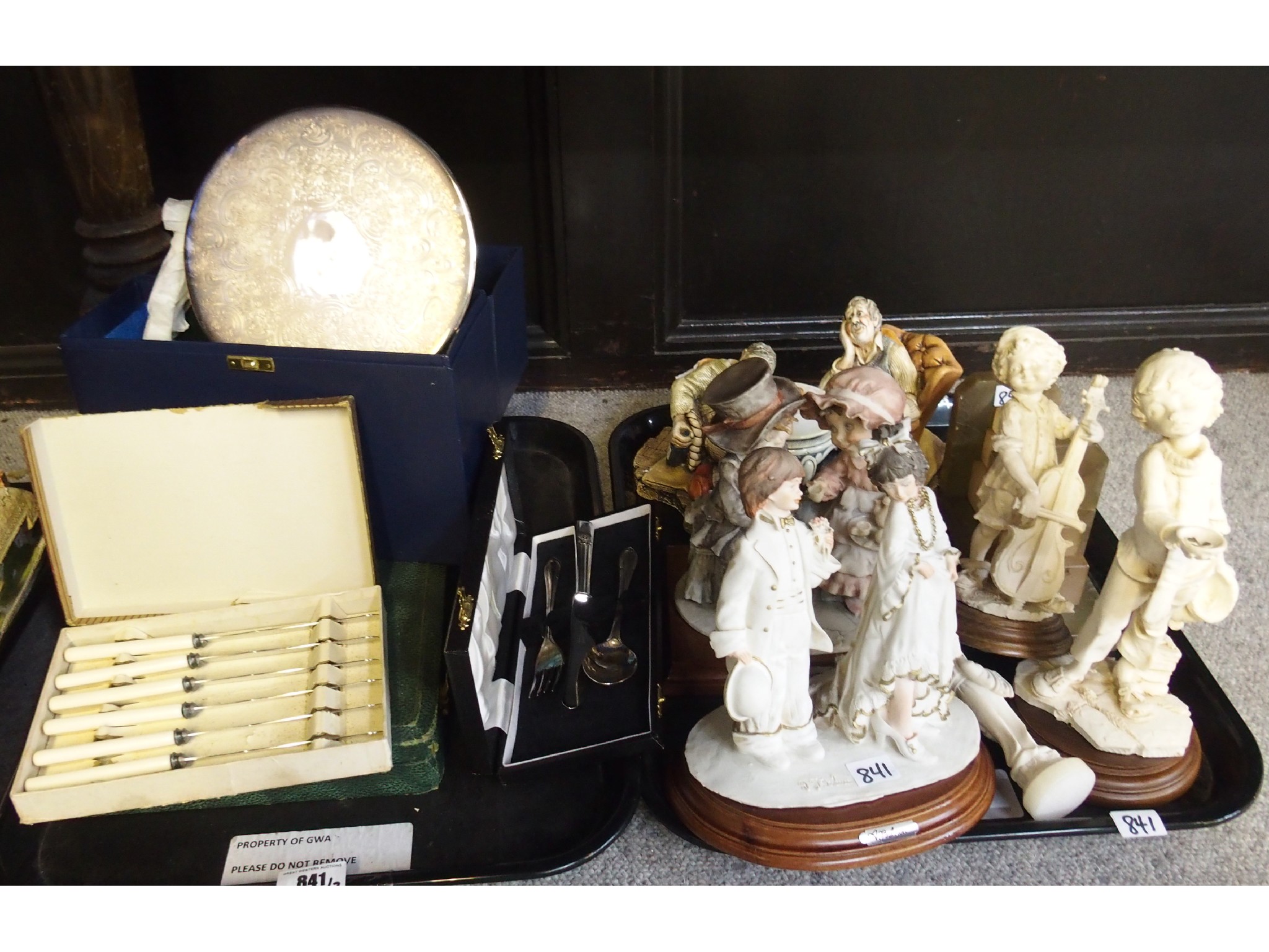 Appraisal: Two trays comprising onyx bookends box of silverplate trivets cased