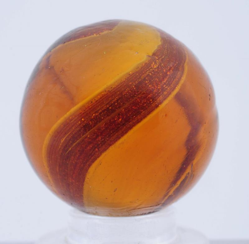 Appraisal: Amber Glass Ribbon Lutz Marble Amber base with white ribbon