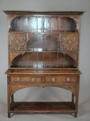 Appraisal: An oak dresser early th century the moulded cornice above