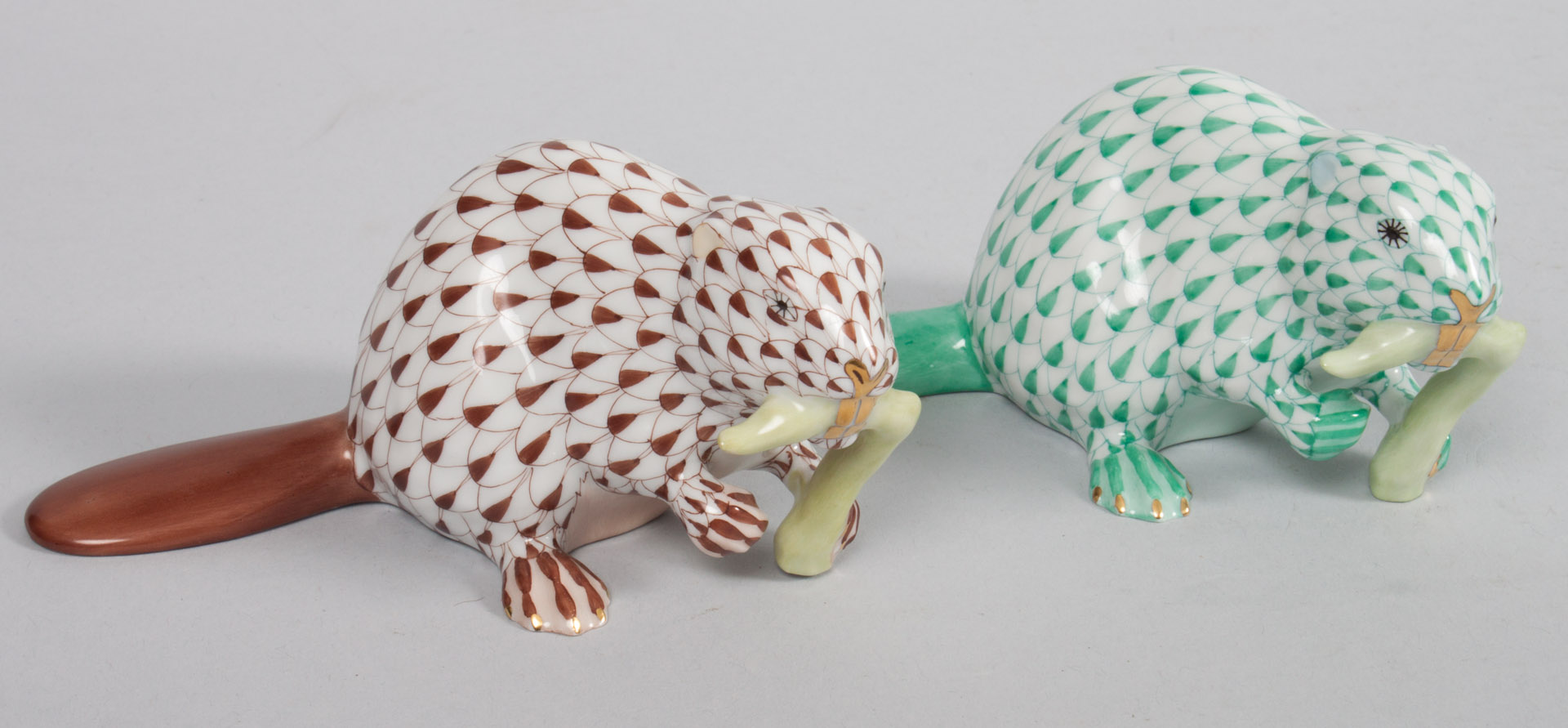 Appraisal: Two Herend porcelain beavers in the Green and Chocolate Fishnet