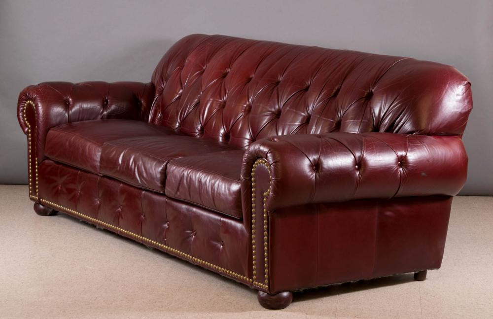 Appraisal: BURGUNDY LEATHER SOFA Leather Masters label H x L