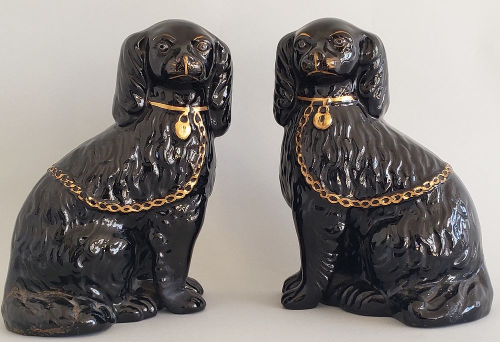 Appraisal: Pair of th Century Staffordshire King Charles Spaniels Pair of