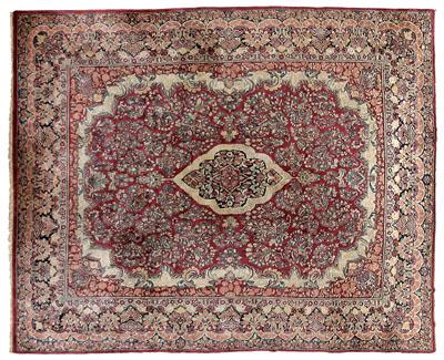 Appraisal: Room size Sarouk rug central medallion on burgundy field ivory