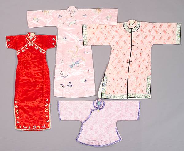 Appraisal: Four Chinese silk garments Including a light pink padded cheongsam