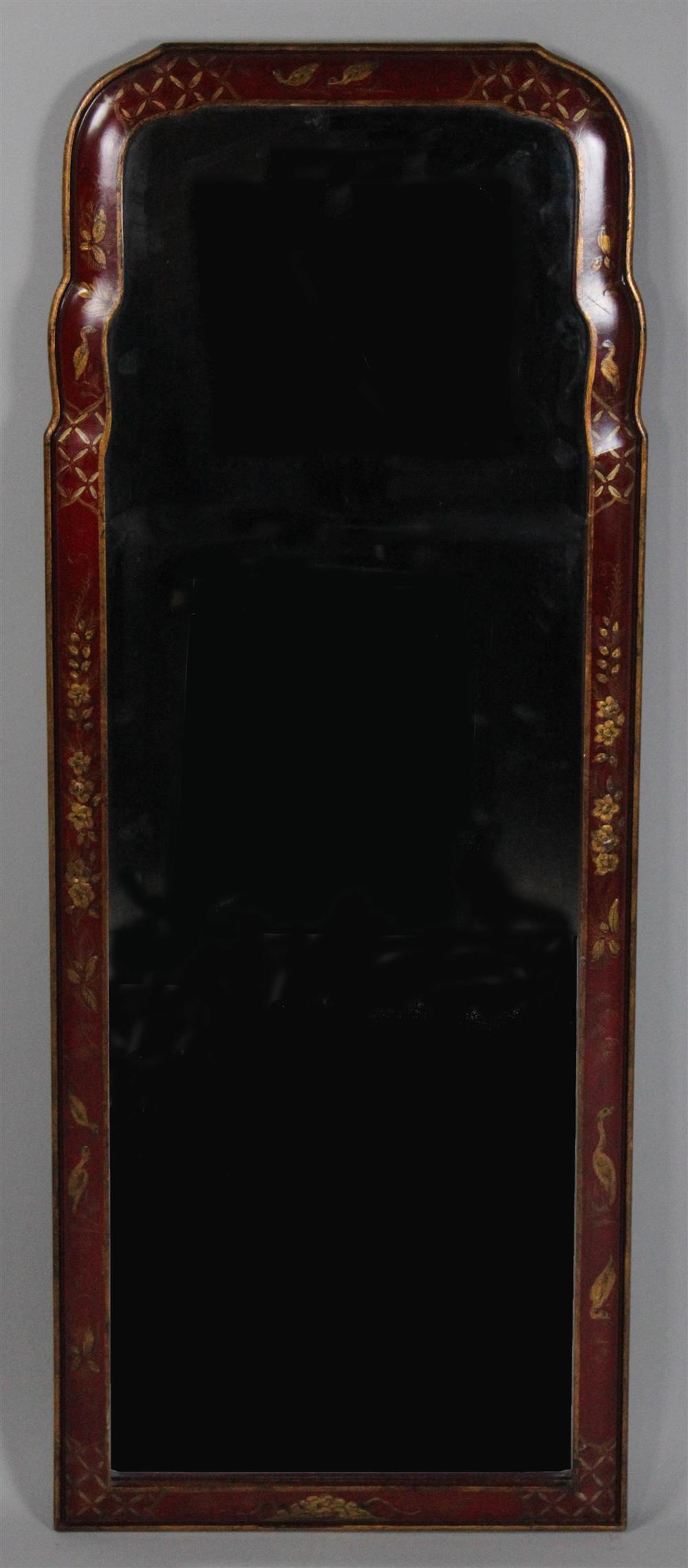 Appraisal: GEORGIAN STYLE GILT AND RED JAPANNED MIRROR the two-part beveled