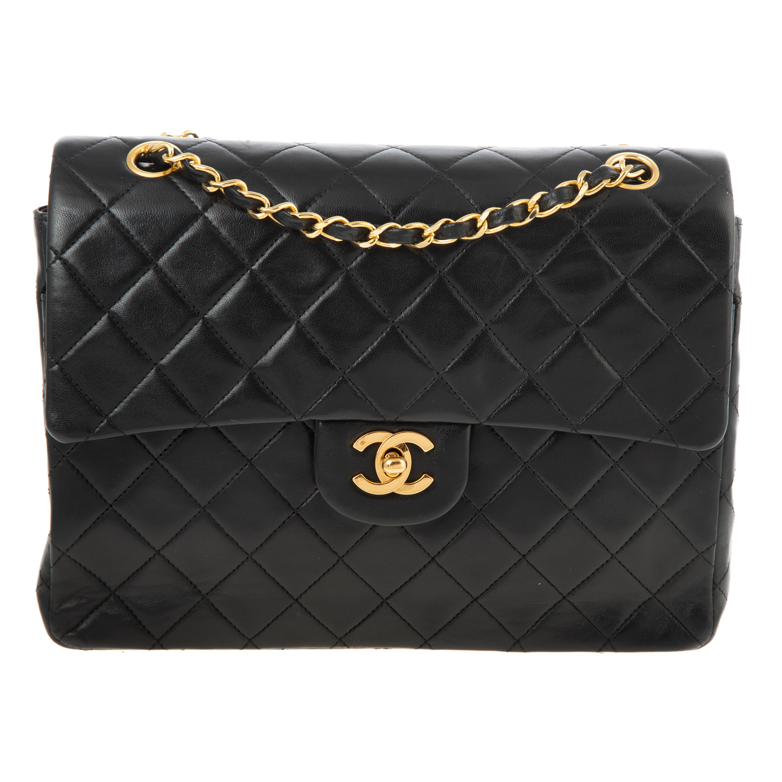 Appraisal: A CHANEL TALL CLASSIC FLAP BAG A black lambskin leather