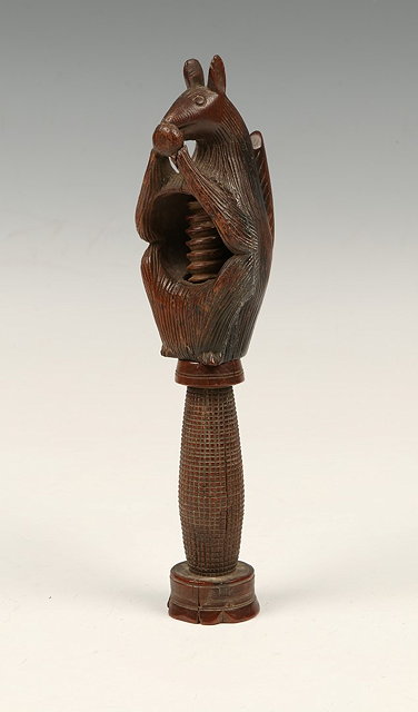 Appraisal: A TREEN CARVED WOOD NUTCRACKER in the form of a