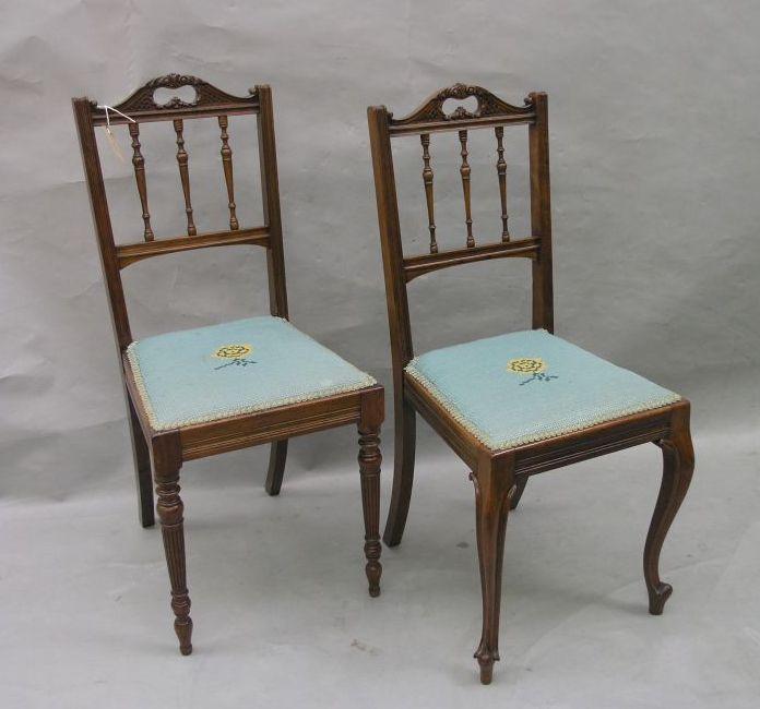 Appraisal: A pair of late Victorian walnut bedroom chairs with carved