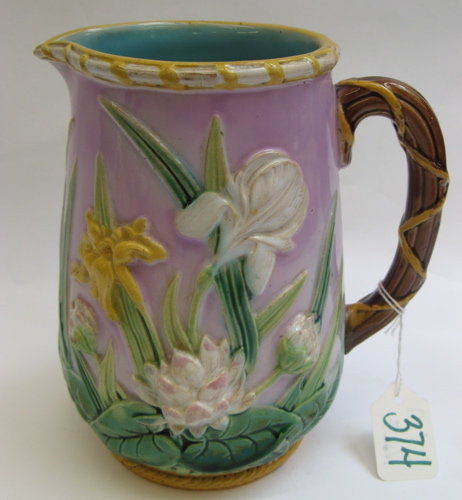 Appraisal: MAJOLICA POTTERY PITCHER water lilies and iris among green leaves