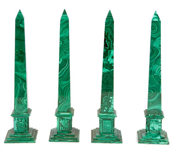 Appraisal: A group of four malachite obelisks each measures height in