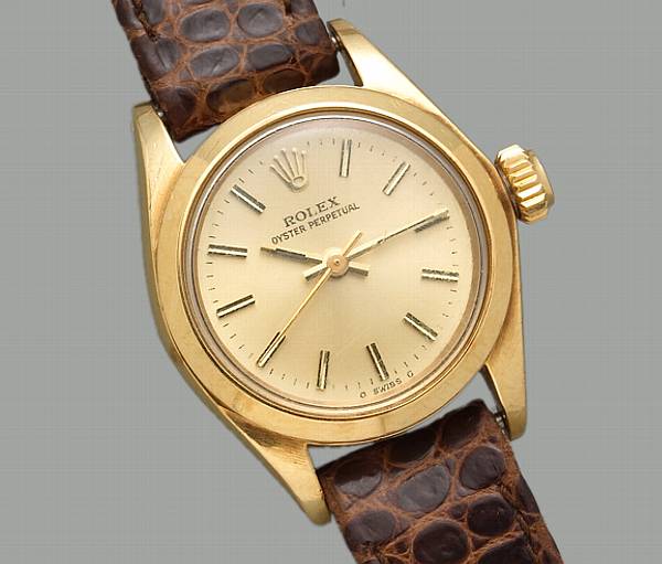 Appraisal: A Rolex Oyster Perpetual lady's eighteen karat gold wristwatch with