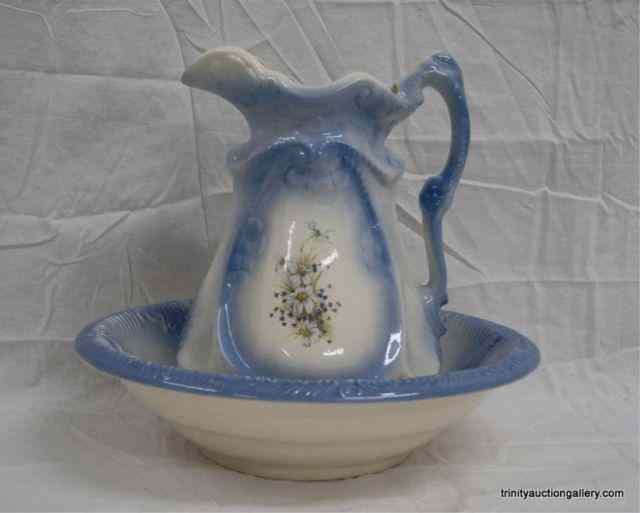 Appraisal: Blue on White Ceramic Wash Bowl Pitcher SetFrom the estate