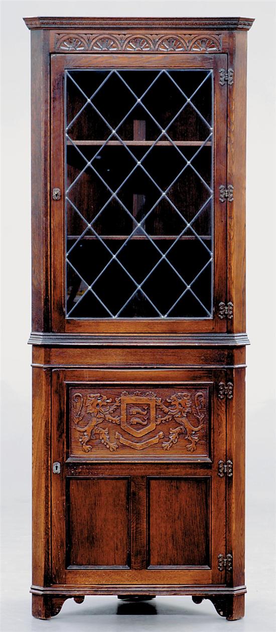 Appraisal: English carved oak corner cabinet Ethan Allen molded crown with